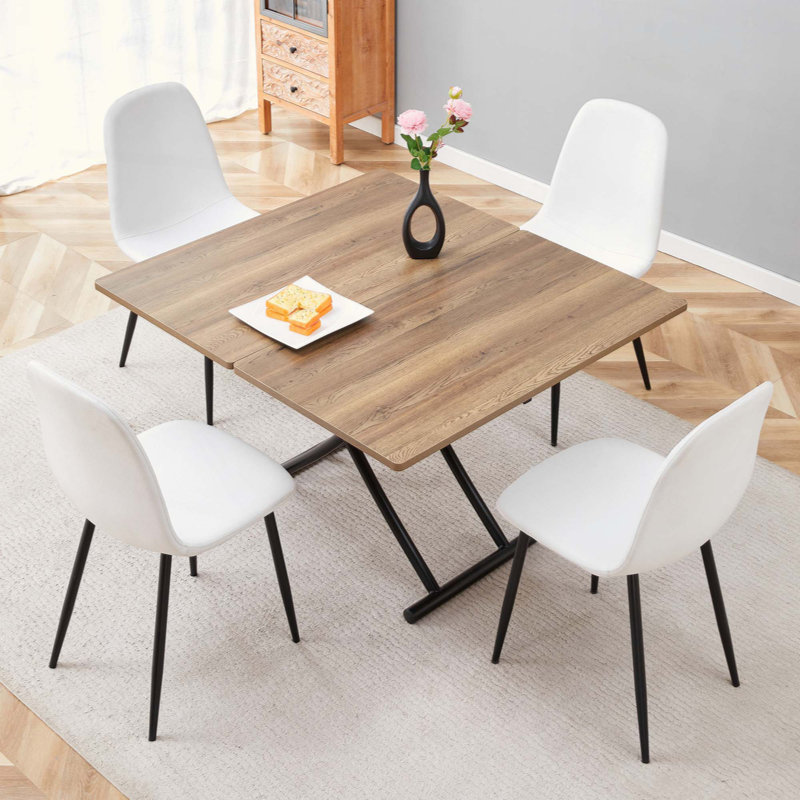 Plateforme de levage moderne et multifonctionnelle, plateau en panneau de fibres à densité moyenne, pieds en métal et 4 chaises de salle à manger blanches en tissu de lin.
