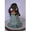 Fille assise sur le sol en train de profiter des statues en bronze 22 po x 15 po x 19 po