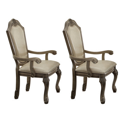 Ensemble de 2 chaises à accoudoirs antiques à dossier solide blanc