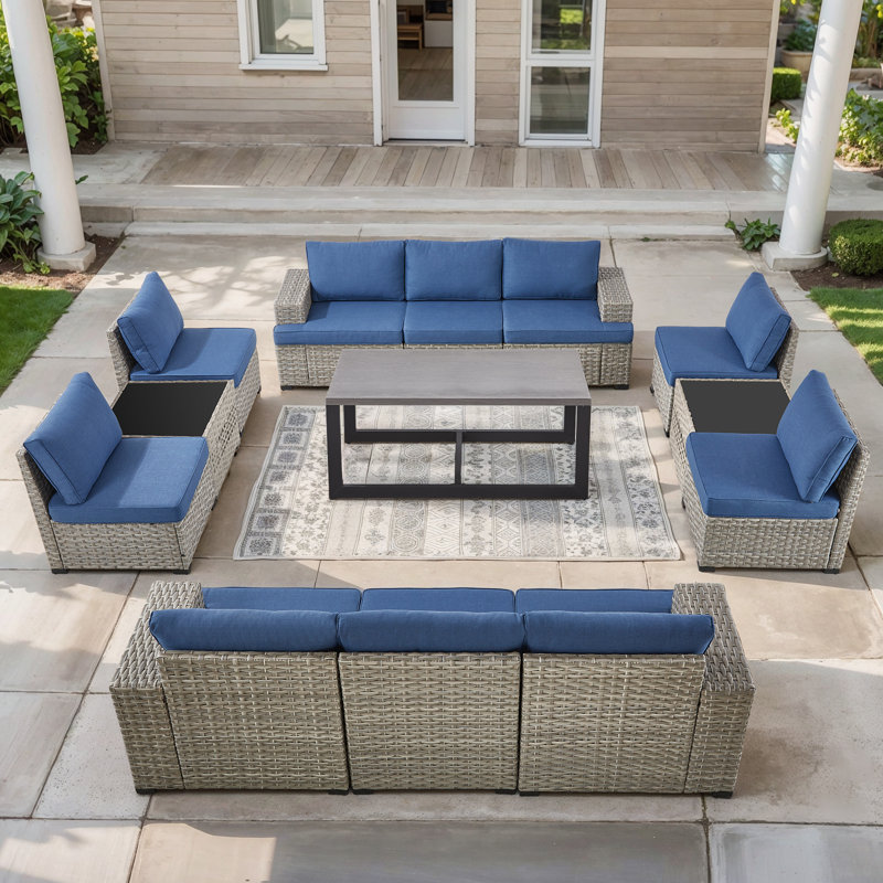 Ensemble de conversation modulaire en rotin et osier avec chaises sans accoudoirs et table basse pour 10 personnes Clute Arnoltice