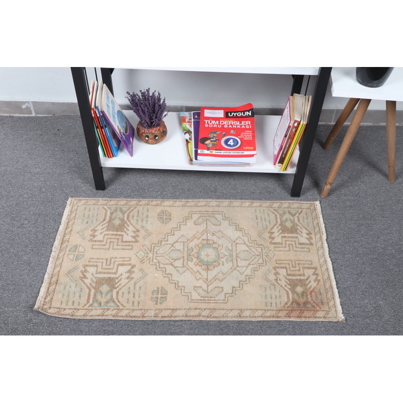 Tapis de porte turc rétro dans des tons beiges et pastel avec motif géométrique tissé à la main à partir de laine pour une décoration bohémienne