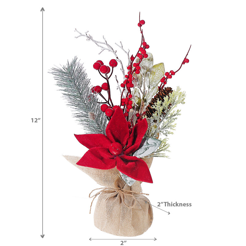 Arrangement floral de poinsettias en pot