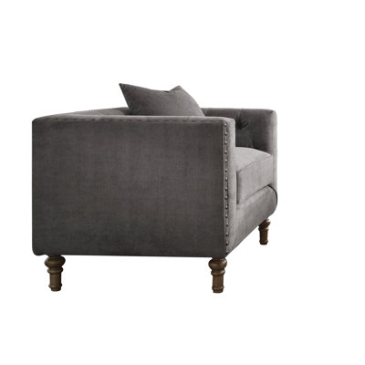 Chaise d'appoint grise avec coussin