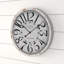 Horloge murale en bois blanc