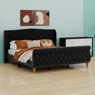 Platform bed frame with sleigh-style footboard and tufted wingback headboard