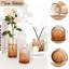 Ensemble de 36 petits vases en verre ambré, parfaits pour décorer vos centres de table. Bouteilles en verre vintage, vases transparents de formes variées, idéaux pour une décoration de table rustique, un mariage ou une décoration intérieure.-616948037