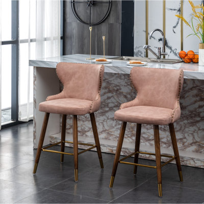 Mid-century Modern Pink Counter Stools (2) - Faux Leather Upholstery, Button Back, Nailhead Trim, Tapered Walnut Legs, Metal Footrest (2) , Trimmed, S