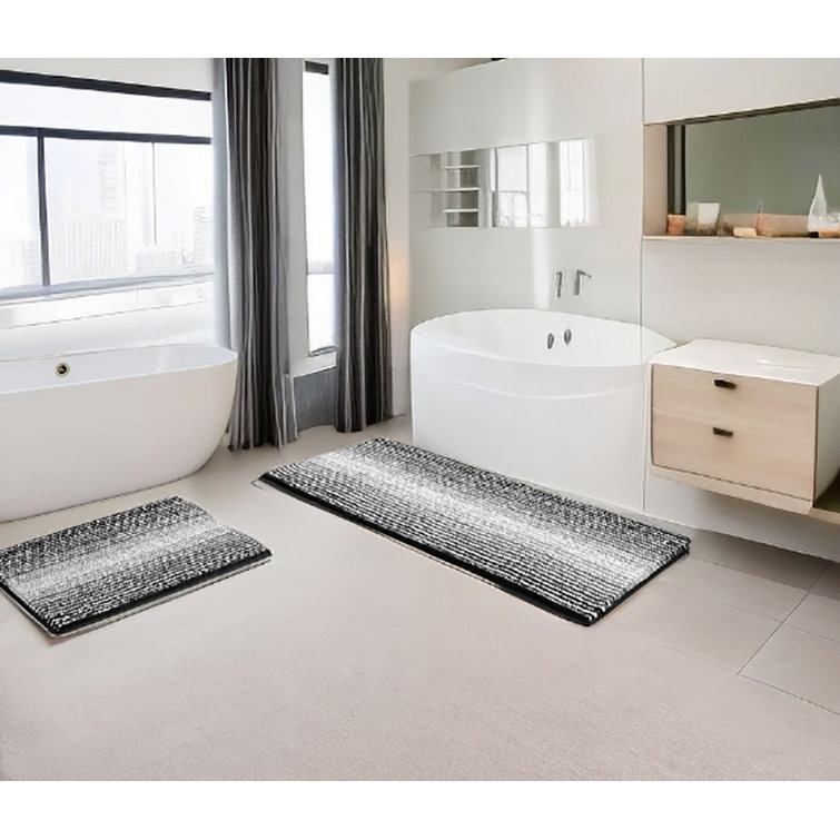 https://assets.wfcdn.com/im/56481435/resize-h755-w755%5Ecompr-r85/2607/260767877/Kahliel+Ombre+Bath+Rug.jpg