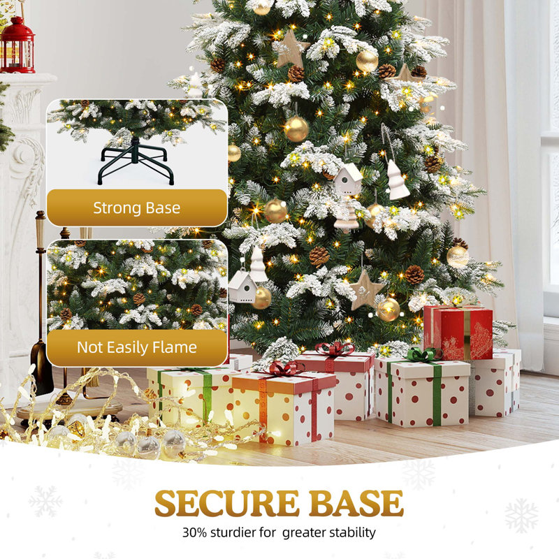 Arbre de Noël vert floqué pré-éclairé avec pommes de pin
