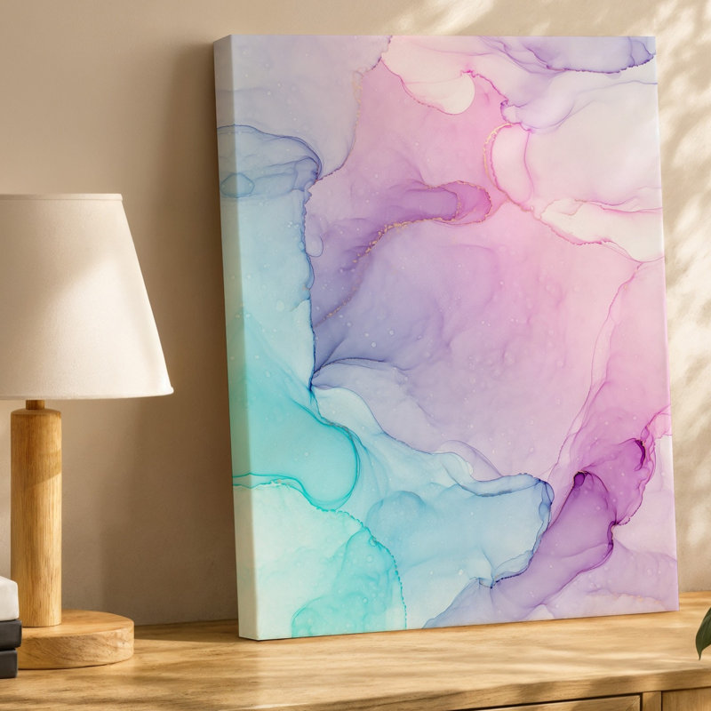 La toile crée un fond abstrait doux mettant en vedette des textures aquarelles douces mélangeant des nuances de rose pâle et un art mural sur toile