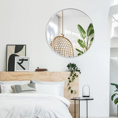 Miroir mural rond avec cadre en métal