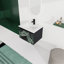 Meuble-lavabo moderne 24 po. Contreplaqué noir avec porte à fermeture en douceur silencieuse. L'évier en céramique fonctionne parfaitement pour une belle
