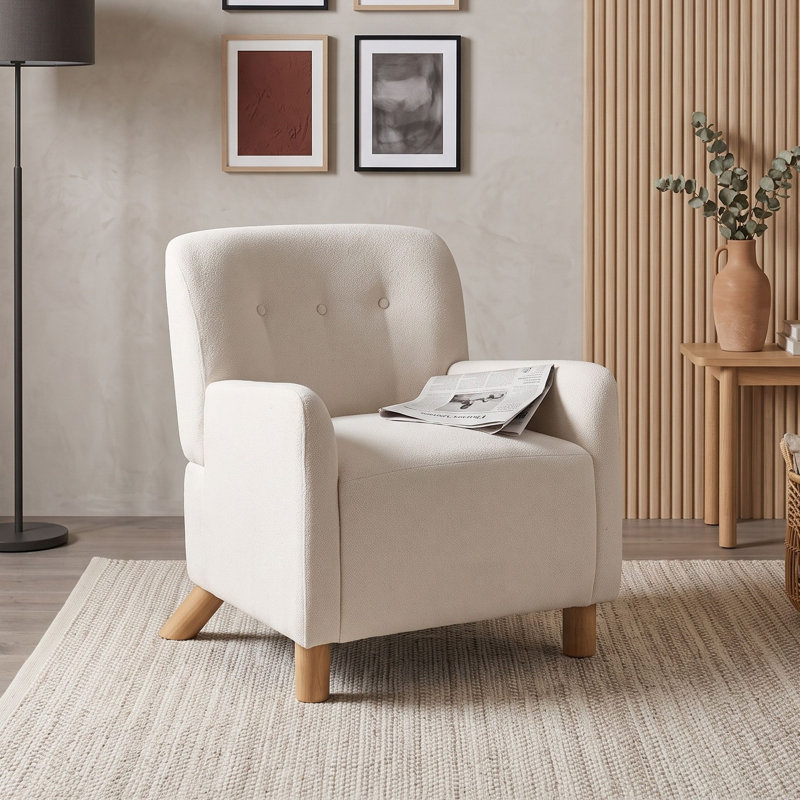Fauteuil d'appoint capitonné avec coussin en mousse, accoudoirs et pieds en bois massif, idéal pour le salon ou un coin lecture.