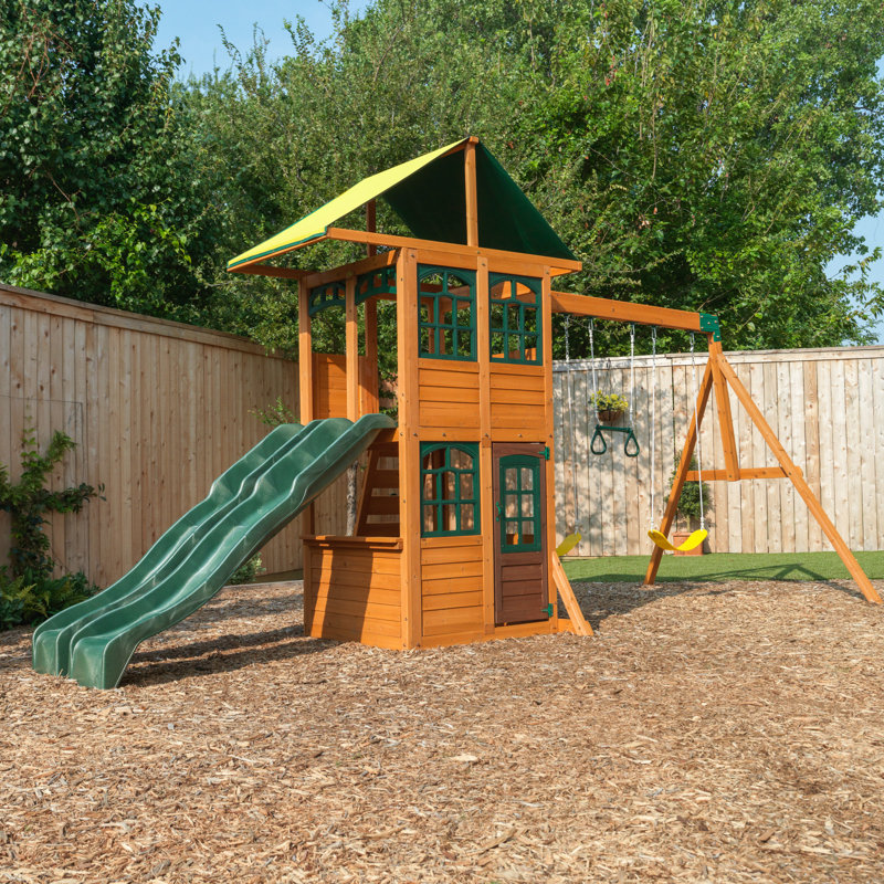 Treasure Cove Wooden Swing Set with Slides and Rock Wall