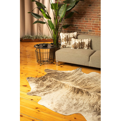Tapis zèbre en peau de vache Abhinav