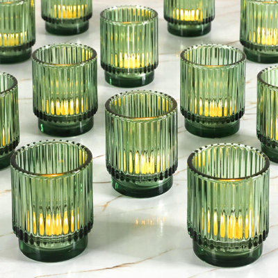 Ensemble de 12 porte-bougies vintage en verre nervuré vert