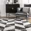 Tapis noir et blanc à motif géométrique-1401825434