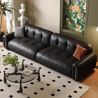 Causeuse-coussin modulable noire en cuir véritable