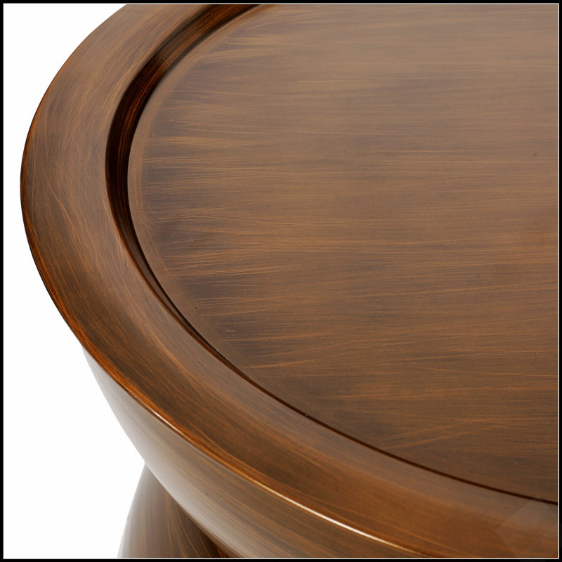 Table basse moderne en métal martelé, avec un design en forme de sablier et un dessus à rebord, pour des espaces de vie élégants.