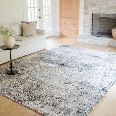 Tapis gris / ivoire à motif abstrait Gwern