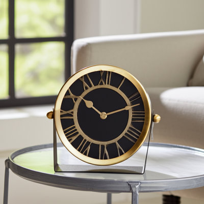 Aparicio Modern Metal and Glass Clock with Roman Numerals and Exposed Frame Stand in Mixed Resin and Aluminum Design