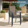 Round Patio Dining Set with 60" Metal Dining Table and 8 Stackable Armrest Textilene Chairs
