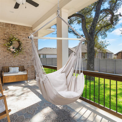1 - Person Hanging Porch Swing and Cushions