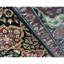 Lamani Wool Oriental Area Rug in Black/Red/Beige/Green