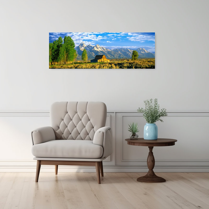 Sunrise Over The Moulton Barn Along Mormon Row Teton Range Mormon Row Historic District Grand Teton National Park Wyoming USA by Leo L. Larson - Wrapped Canvas Panoramic Print