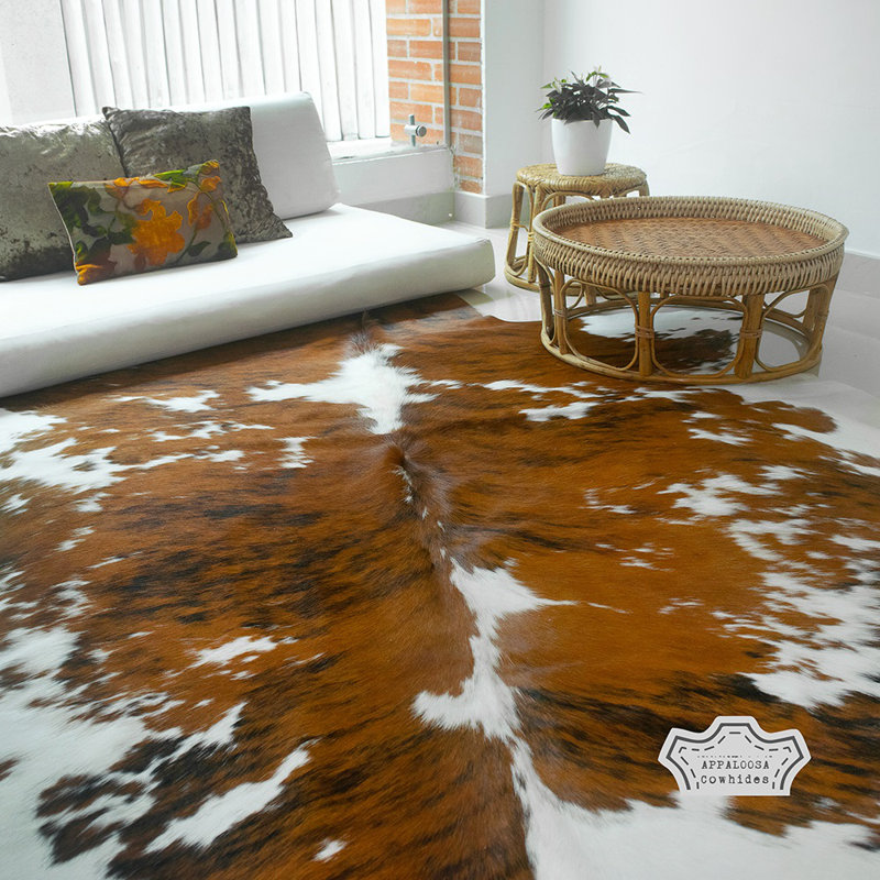 Handmade Black and Brown Cowhide Round Area Rug