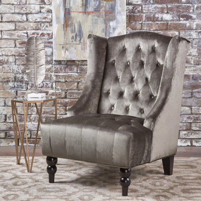 Fauteuil club Tesy, dossier haut, velours capitonné gris, pieds en bois noir