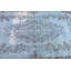 Élégant tapis turc bleu et brun à motif floral idéal pour décorer un salon ou une chambre à coucher
