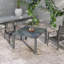 Table de salle à manger extensible pour patio, gris foncé, 104 cm à 211 cm, structure en aluminium et plateau en acier imitation bois. Table extensible de 183 cm à 211 cm avec plateau.