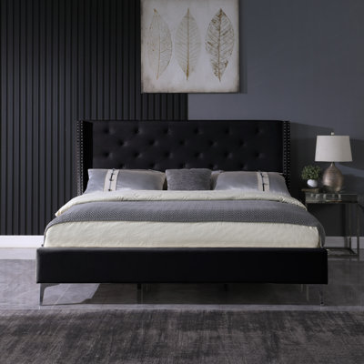 Diwata Upholstered Wingback Bed