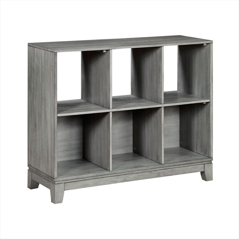Bibliothèque cubique à six étagères et dos ouvert, idéale pour ranger les choses dans une chambre ou un salon.