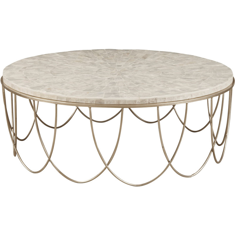 Round Stone Top Cocktail Table With Decorative Metal Base