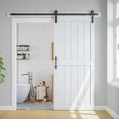 84" Manufactured Wood Bookshelf Style Barn Door Primed with Mounting Hardware Kit