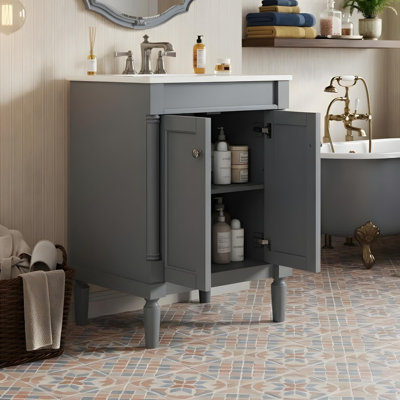 Modern bathroom vanity with a ceramic sink and two-tier storage cabinets