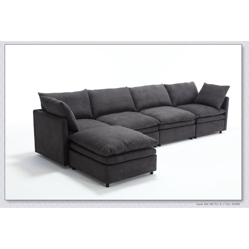 Canapé modulaire en U avec revêtement de haute qualité et sièges spacieux, parfait pour la vie moderne et les réceptions.