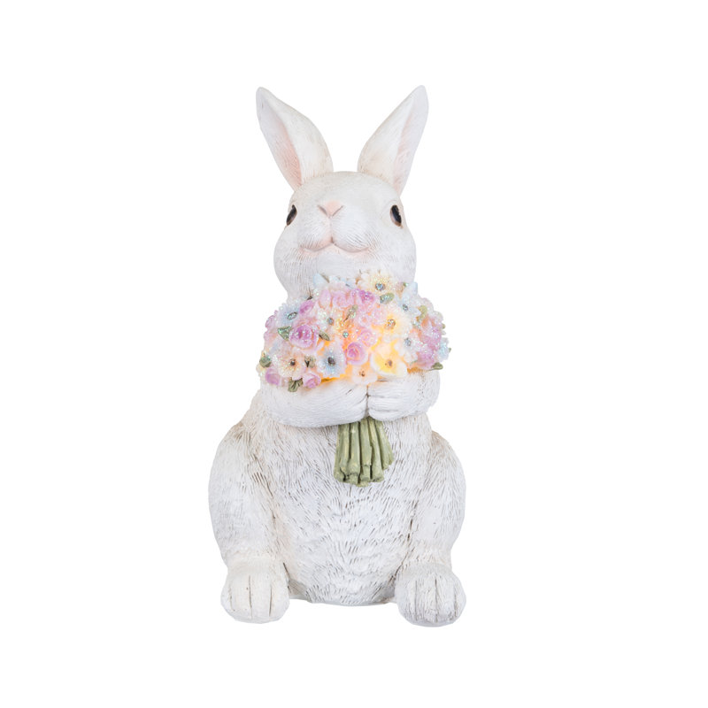Lapin de Pâques avec bouquet de fleurs illuminé