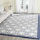 Ammundsen Geometric Area Rug in Ivory/Navy