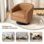 Petit fauteuil pivotant tonneau capitonné Bennett avec garniture cloutée Bennett-482296145