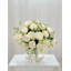 Arrangement de pivoines roses dans un vase