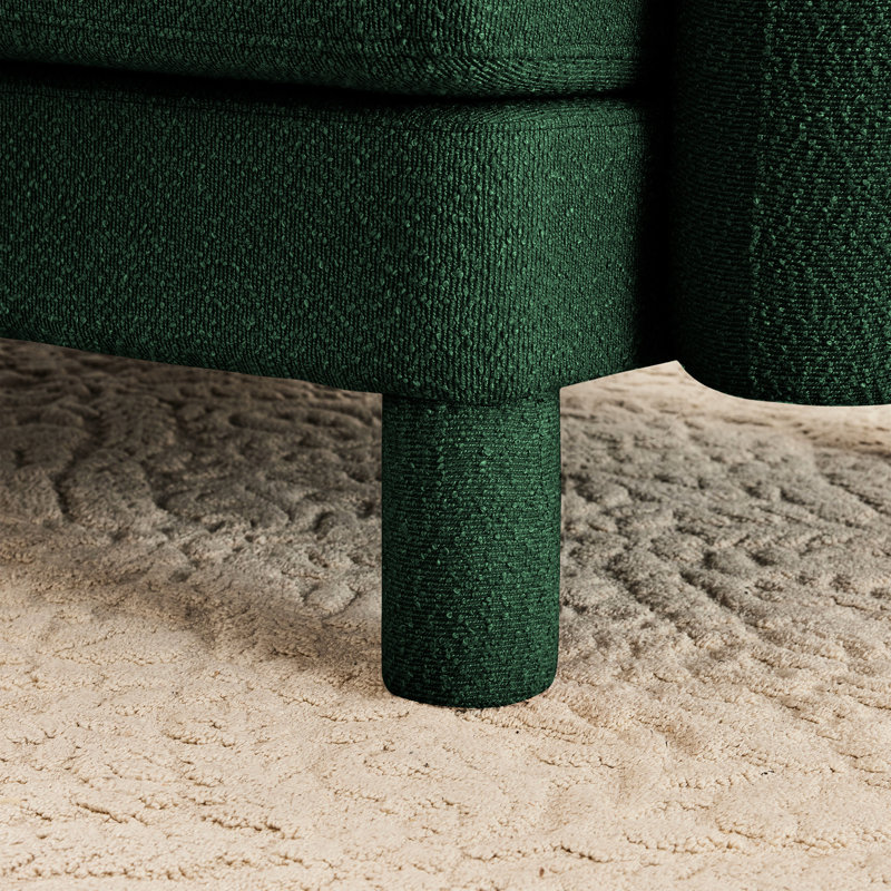 Tissu à 3 boucles avec dossier élégamment incurvé, amovible et doux pour un canapé relaxant. Configuration élégante des pieds cylindriques.