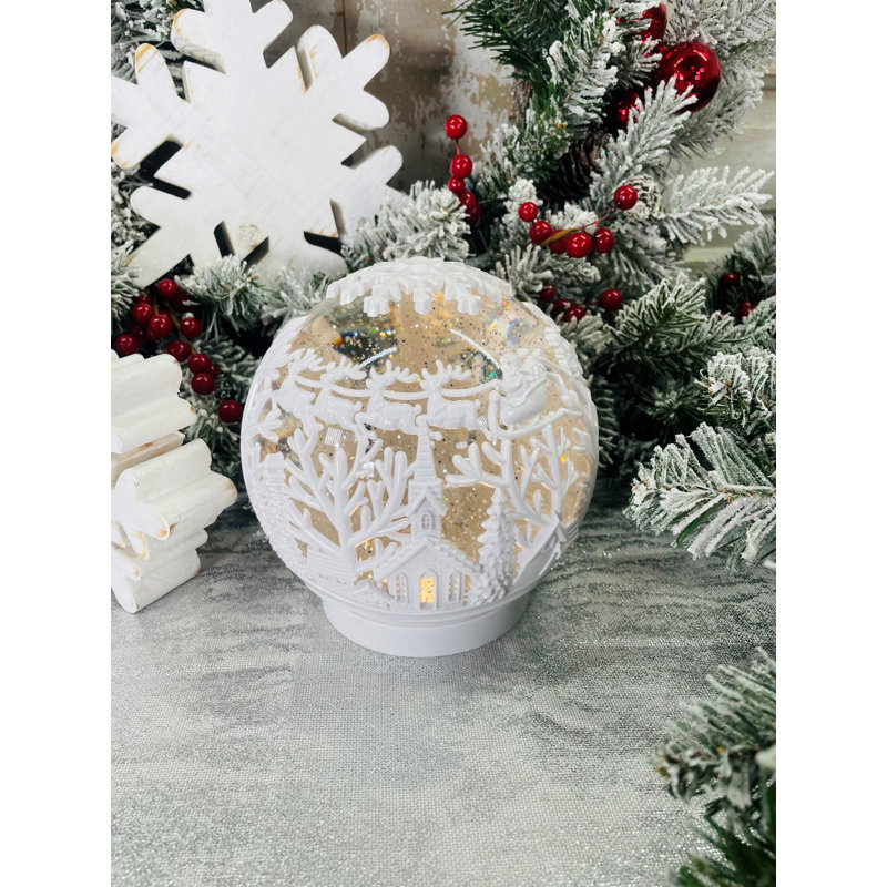 Boule à neige scène d'hiver