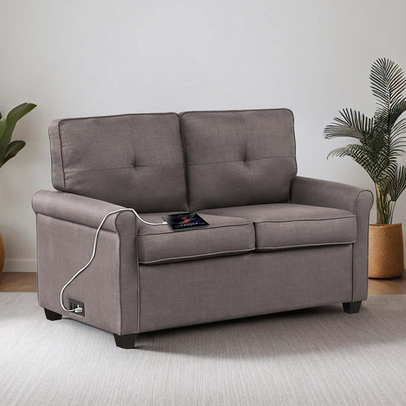 Canapé-lit coulissant polyvalent avec tissu en polyester durable et structure en bois massif pour plus de confort et de style.