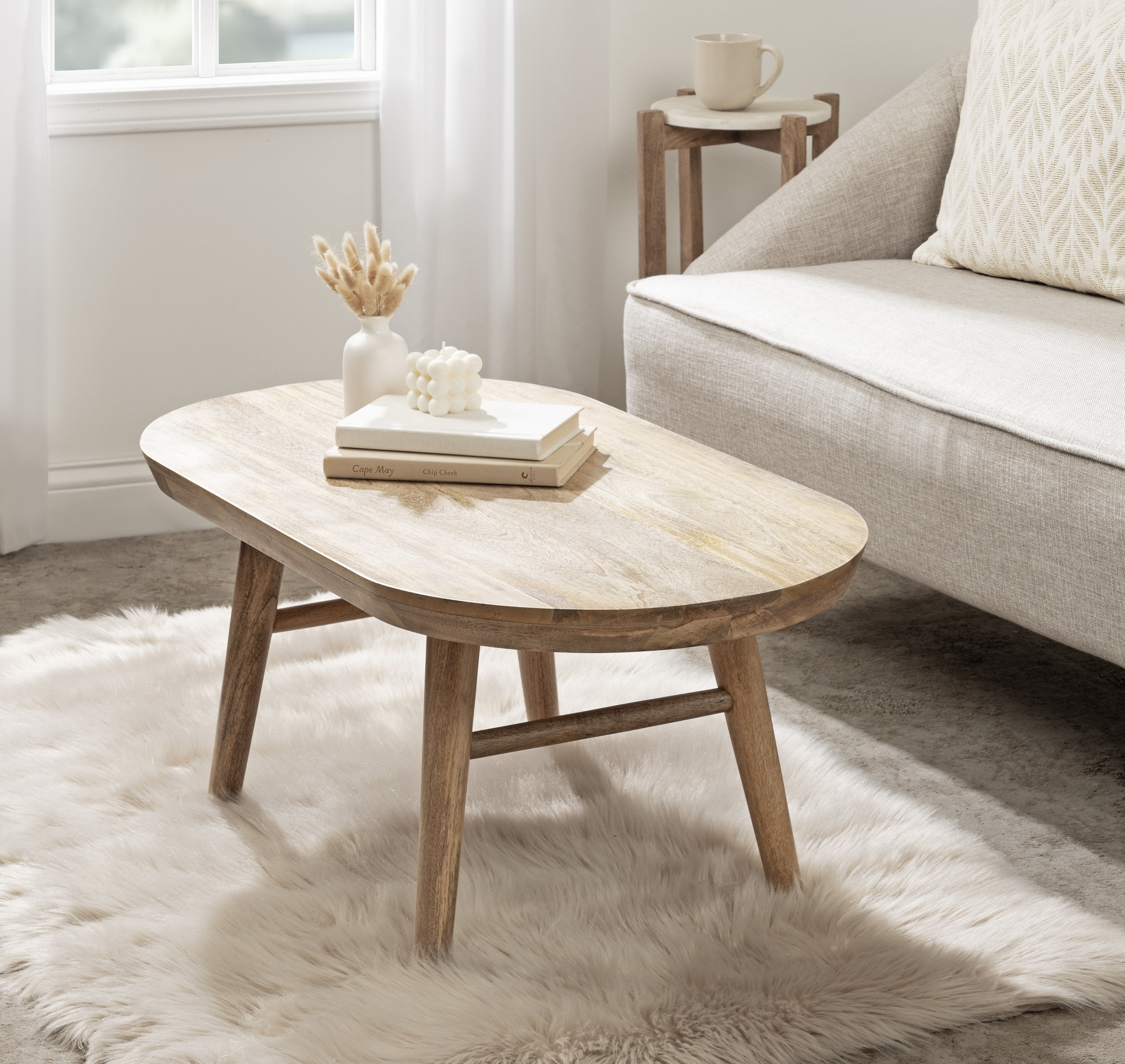 Wade Logan® Berenike Oval Living Room Coffee Table with Tapered Legs & Reviews | Wayfair