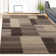 Benne Polypropylene Colour Block Indoor Area Rug With Jute Backing