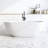 Solid Surface Soaking Tub with Thick Edge, Freestanding Design, and Pop-up Drain for a Luxurious Bathing Experience