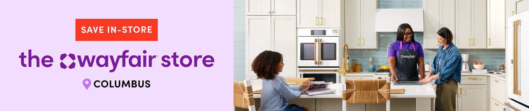 Save in-store at The Wayfair Store in Columbus with a Wayfair associate helping a customer in a model kitchen.